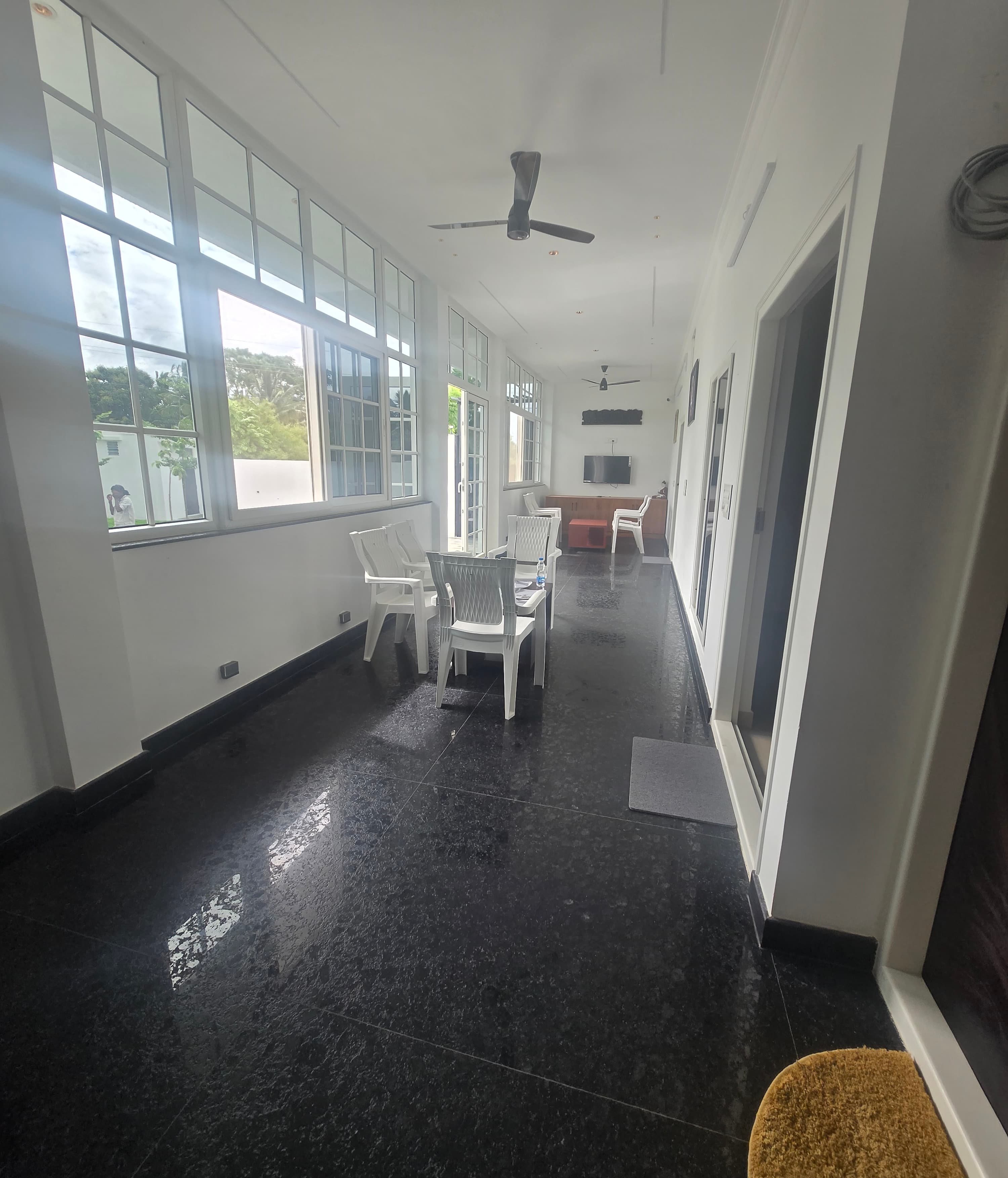 Granite hall — the heart of the villa
